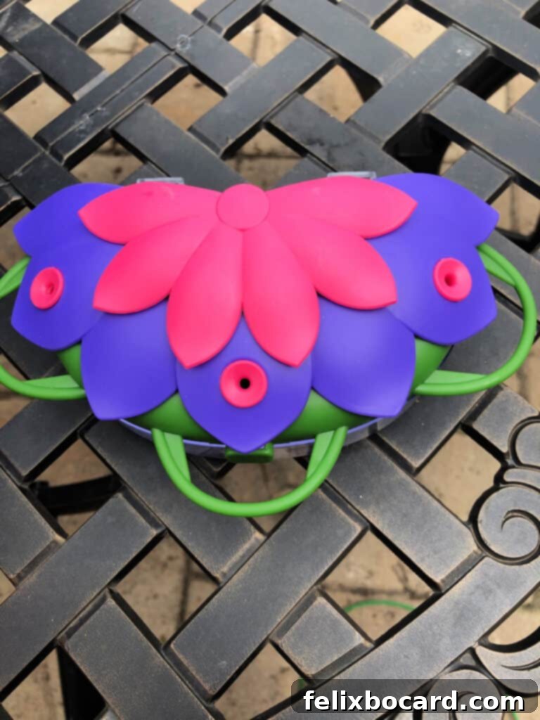 The Art of Hummingbird Feeding 6 Suction cup mounted window hummingbird feeder