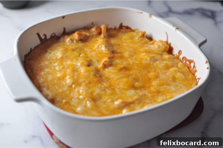 square baking dish containing cheesy casserole