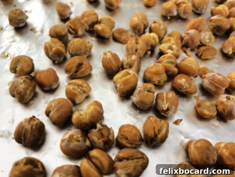 chickpeas on foil after dry roast step