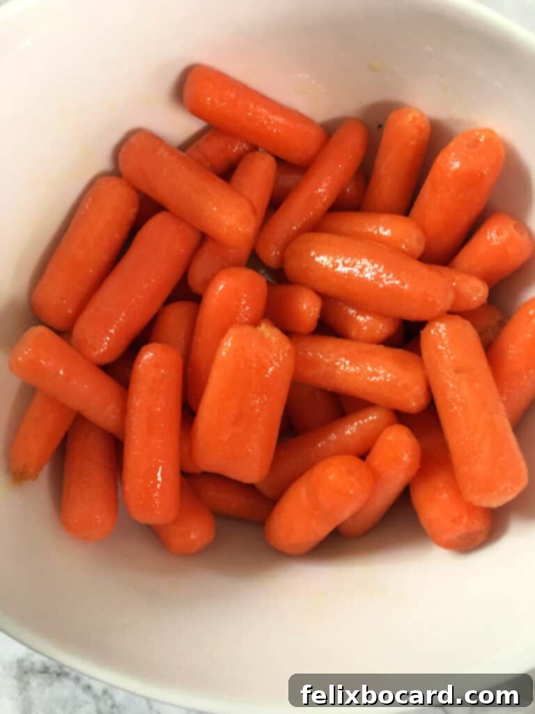 Irresistible Oven Roasted Baby Carrots 2 Raw vegetables with oil